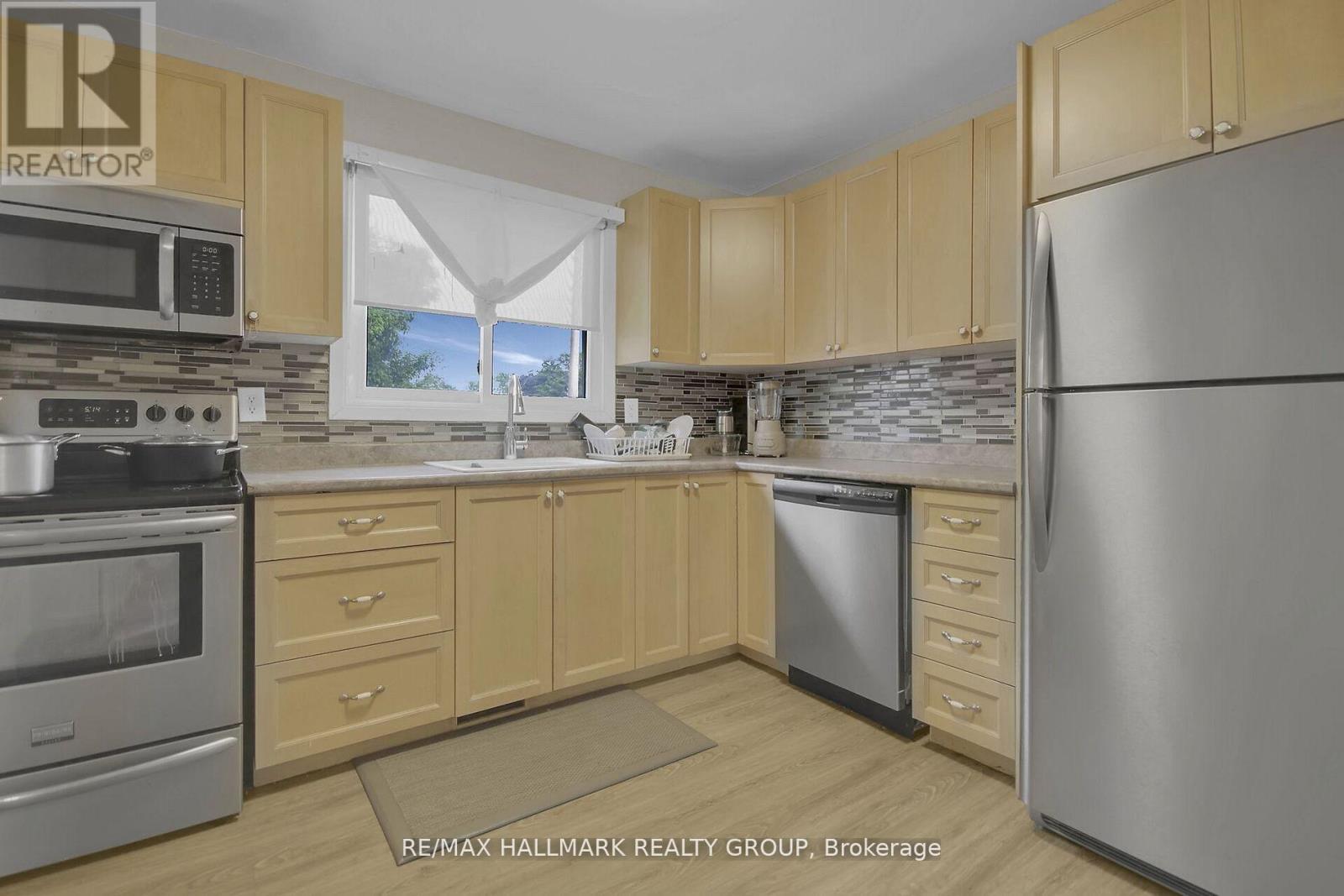Photo 12 of 1 1821 Walkley Road, Ottawa ON