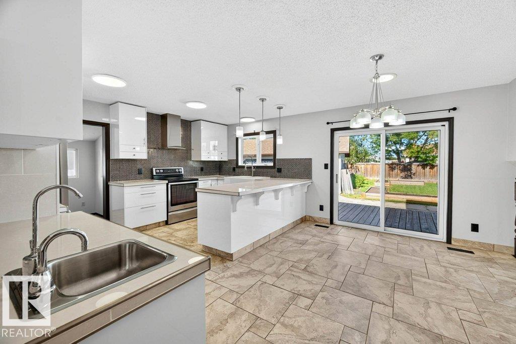 Photo 2 of 10106 89 St, Morinville AB