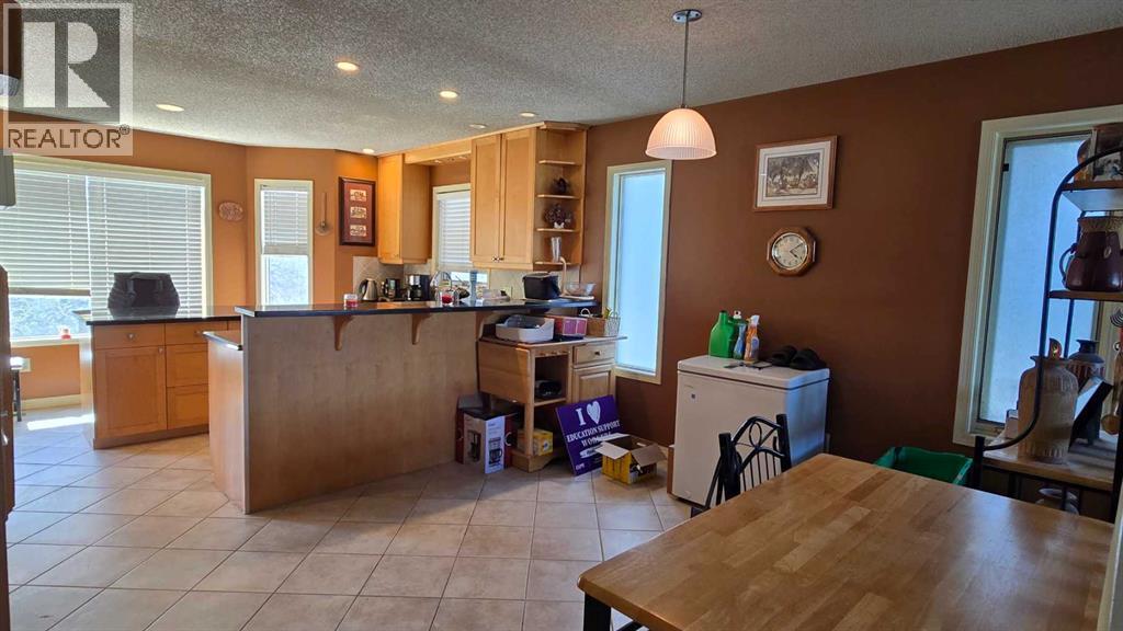 Photo 4 of 203 Arbour Summit Close Nw, Calgary AB