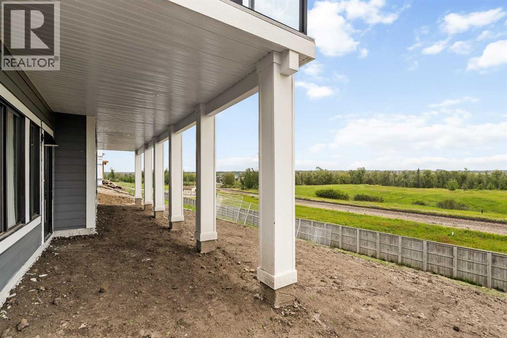 Photo 49 of 90 Cimarron Estates Drive, Okotoks AB