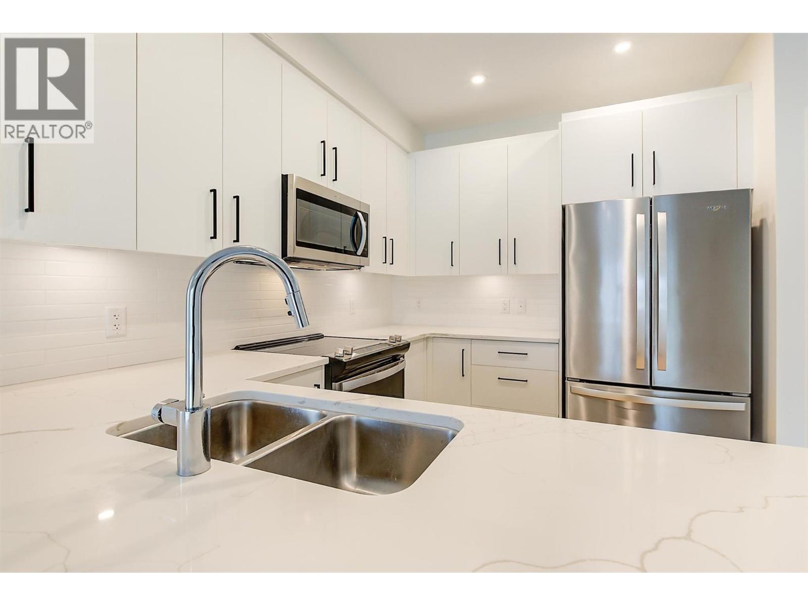 Photo 15 of 3434 Mckinley Beach Drive Unit 309, Kelowna BC