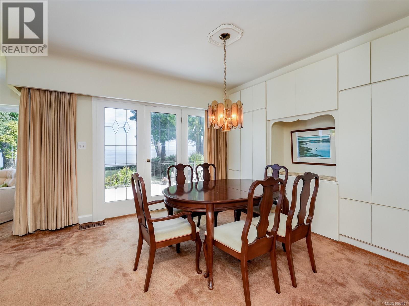 Photo 12 of 4590 Torquay Dr, Saanich BC