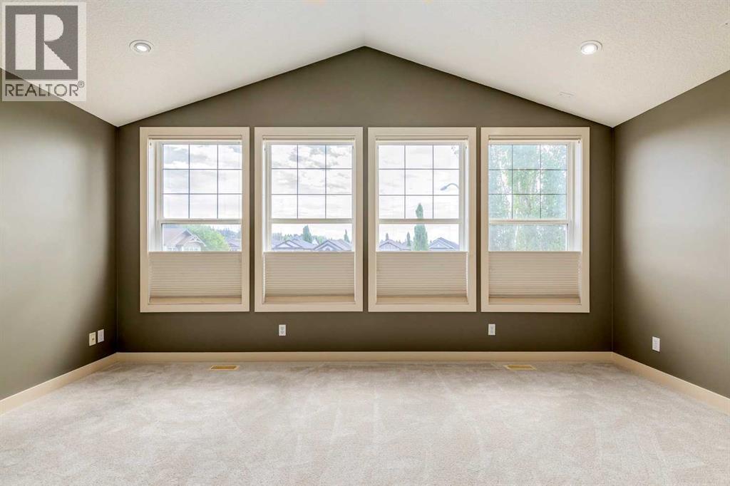 Single Family House for Sale in  Tuscany Summit Green NW Tuscany Calgary 
