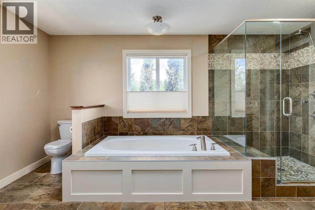 Single Family House for Sale in  Tuscany Summit Green NW Tuscany Calgary 