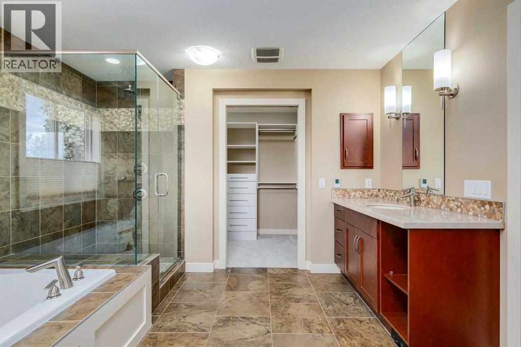 Single Family House for Sale in  Tuscany Summit Green NW Tuscany Calgary 