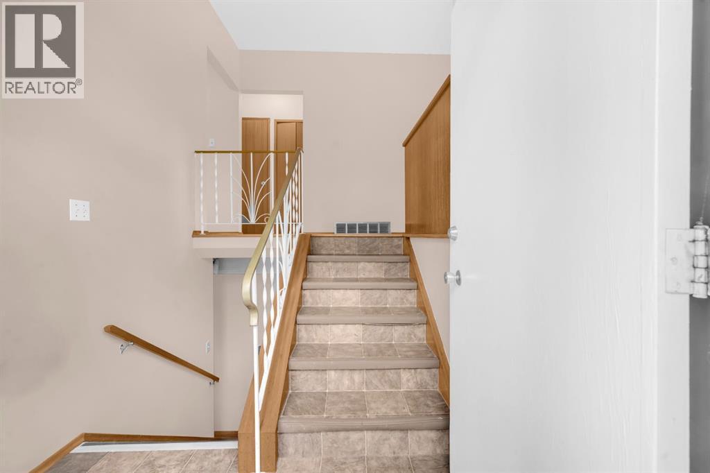 Multi-family House Bi-level for Sale in  Vance Place NW Varsity Calgary 