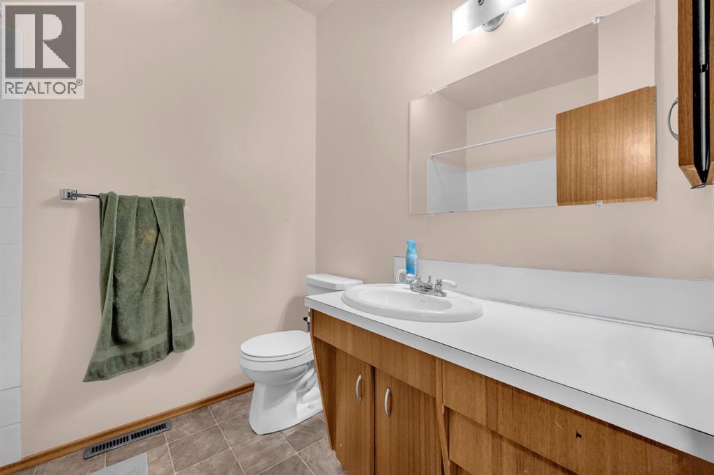 Multi-family House Bi-level for Sale in  Vance Place NW Varsity Calgary 