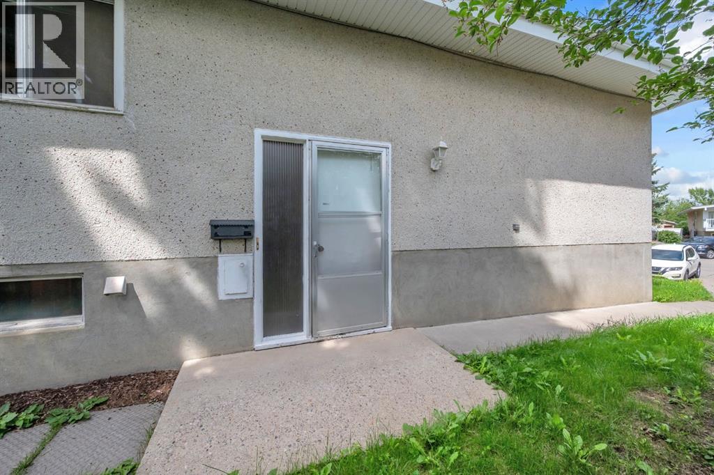 Multi-family House Bi-level for Sale in  Vance Place NW Varsity Calgary 