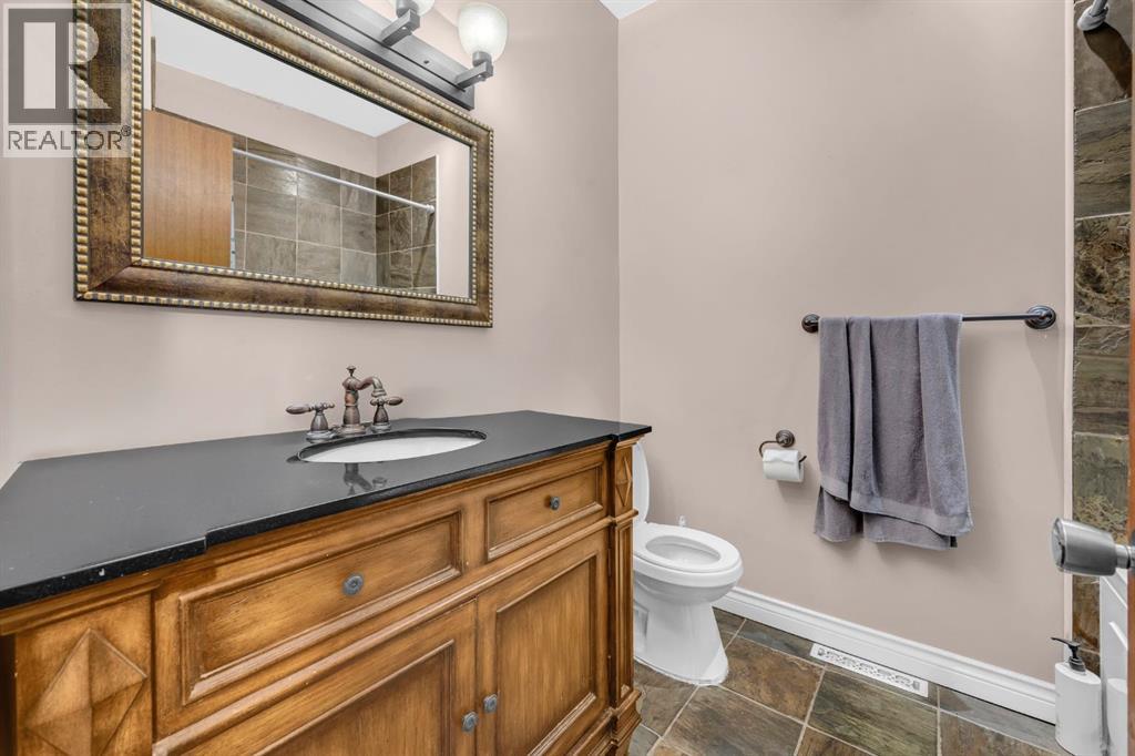 Multi-family House Bi-level for Sale in  Vance Place NW Varsity Calgary 