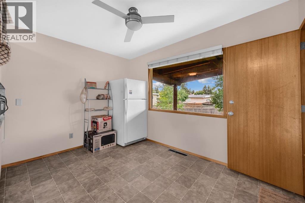 Multi-family House Bi-level for Sale in  Vance Place NW Varsity Calgary 