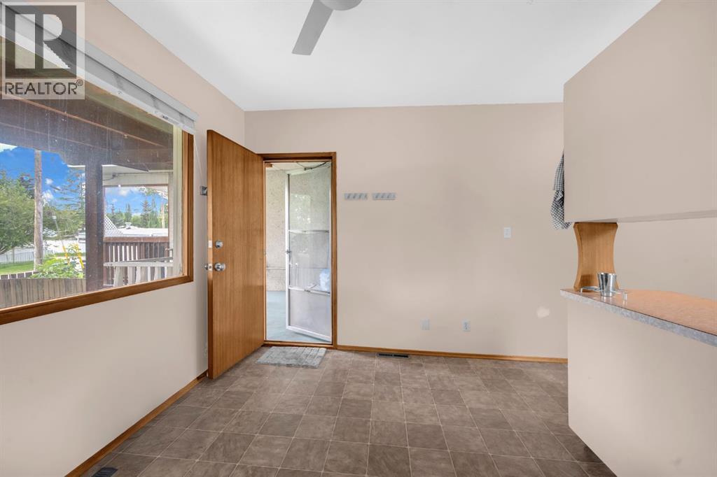 Multi-family House Bi-level for Sale in  Vance Place NW Varsity Calgary 
