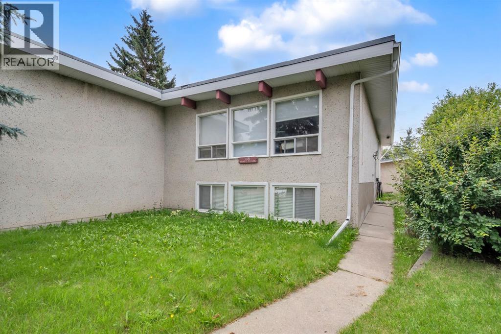 Multi-family House Bi-level for Sale in  Vance Place NW Varsity Calgary 