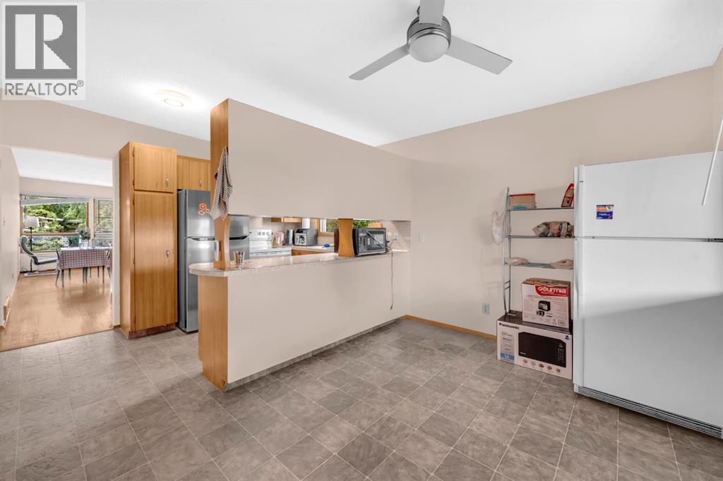Multi-family House Bi-level for Sale in  Vance Place NW Varsity Calgary 