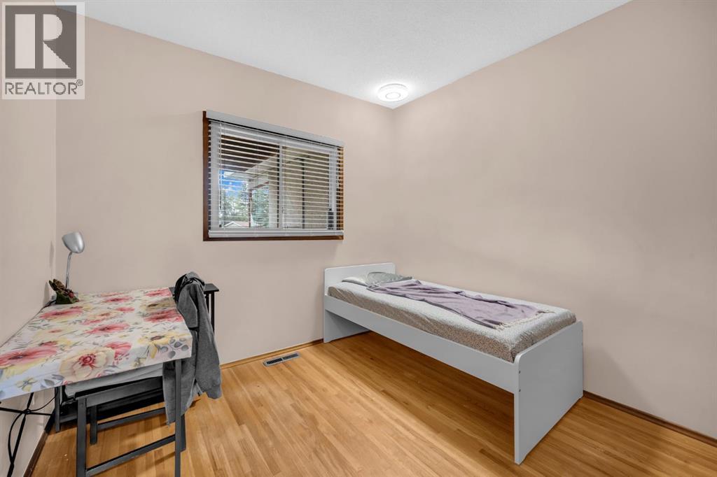 Multi-family House Bi-level for Sale in  Vance Place NW Varsity Calgary 