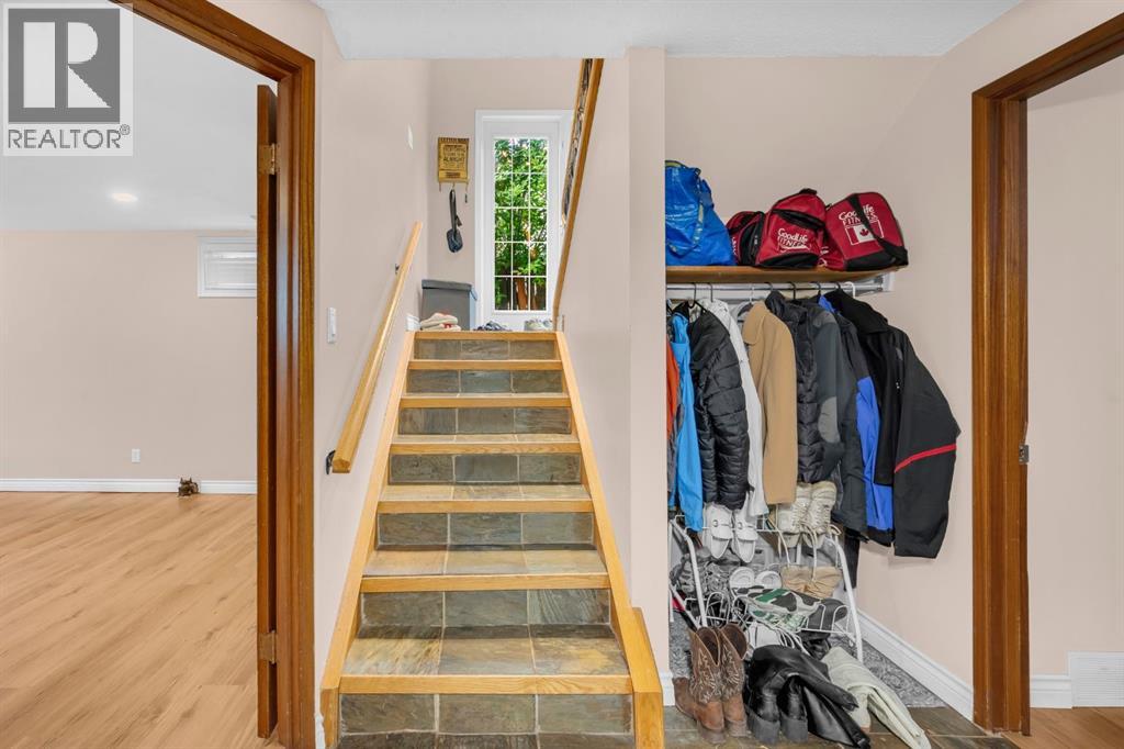 Multi-family House Bi-level for Sale in  Vance Place NW Varsity Calgary 