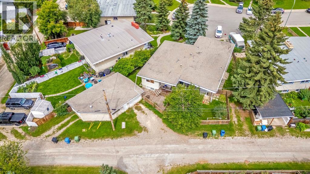 Multi-family House Bi-level for Sale in  Vance Place NW Varsity Calgary 