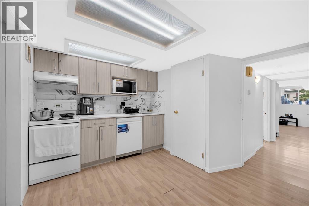 Multi-family House Bi-level for Sale in  Vance Place NW Varsity Calgary 
