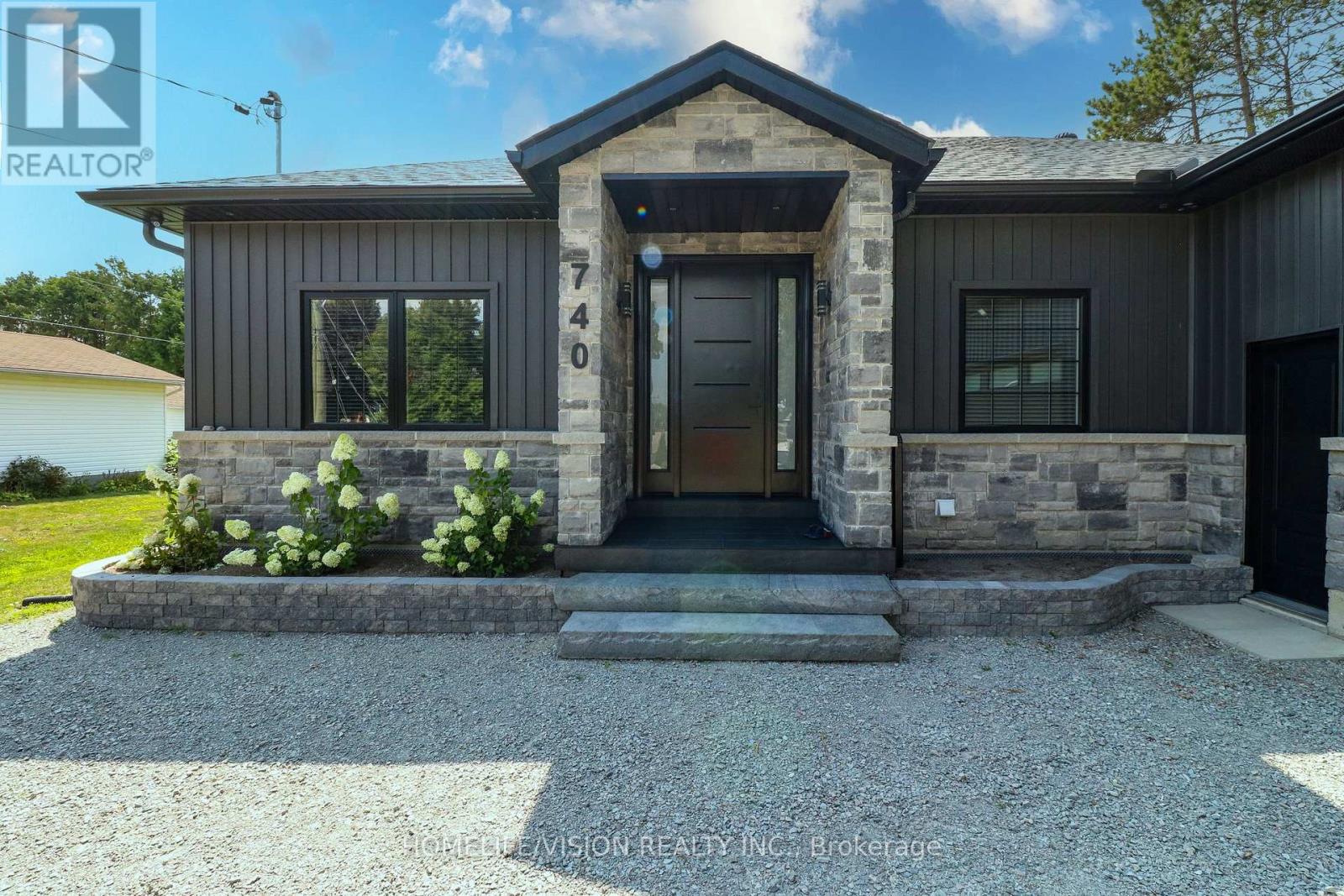 Photo 2 of 740 Midland Avenue, Tay ON