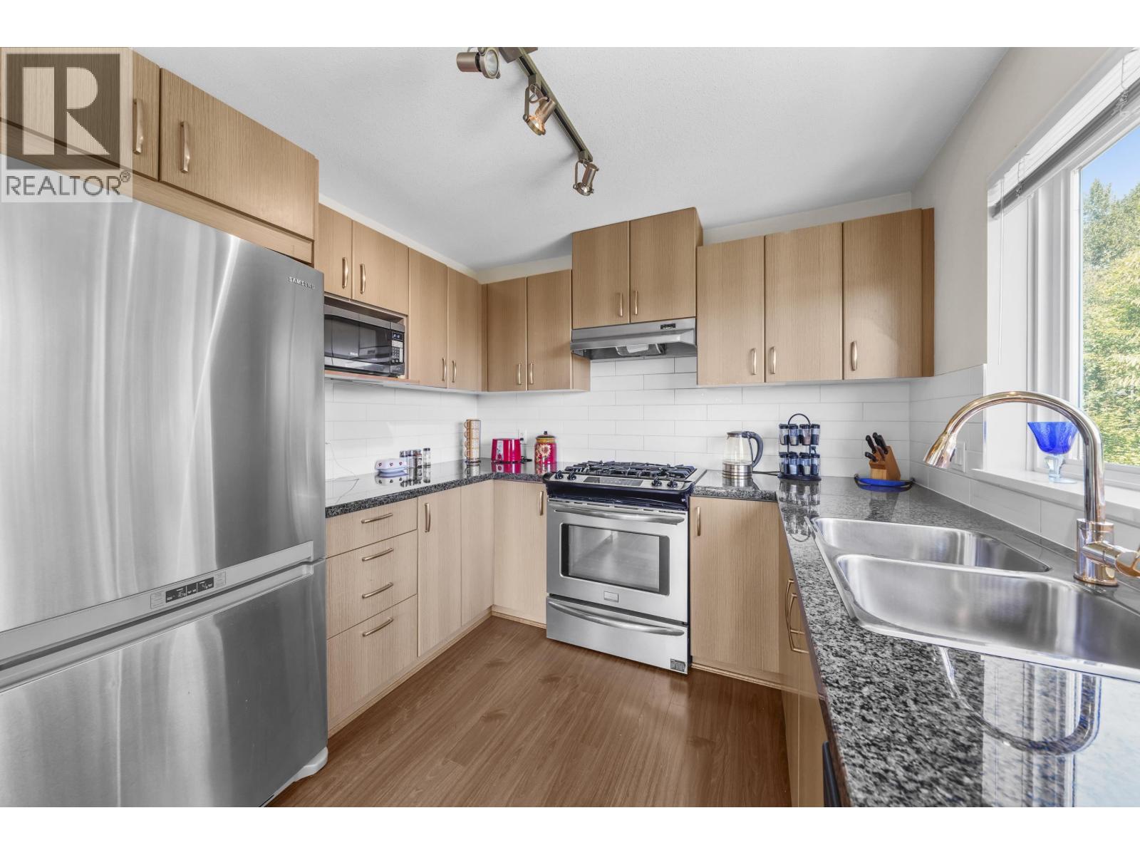 Photo 4 of 415 3050 Dayanee Springs Boulevard, Coquitlam BC