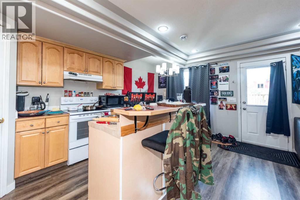 Single Family House 4 Level for Sale in  Erin Circle SE Erin Woods Calgary 