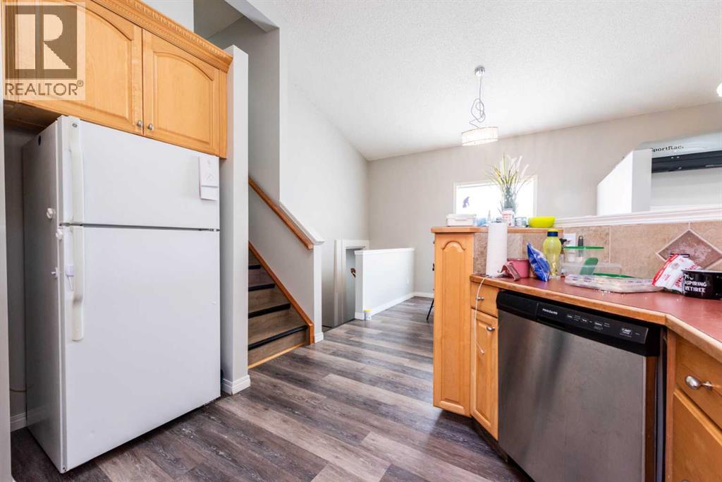 Single Family House 4 Level for Sale in  Erin Circle SE Erin Woods Calgary 