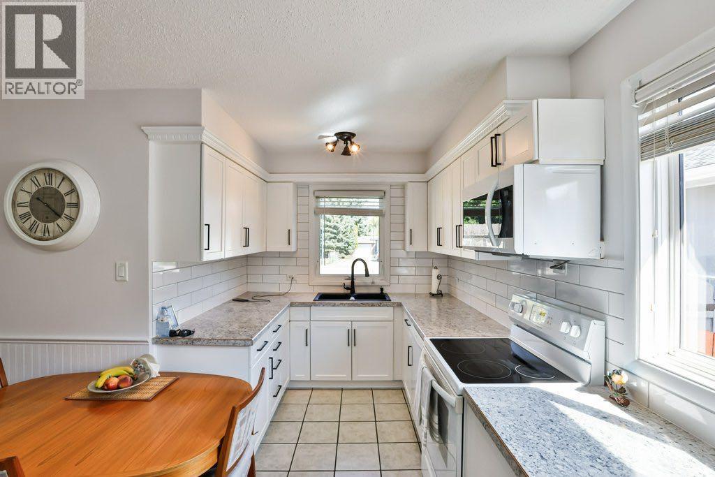 Single Family House Bungalow for Sale in   Street S Glendale Lethbridge 
