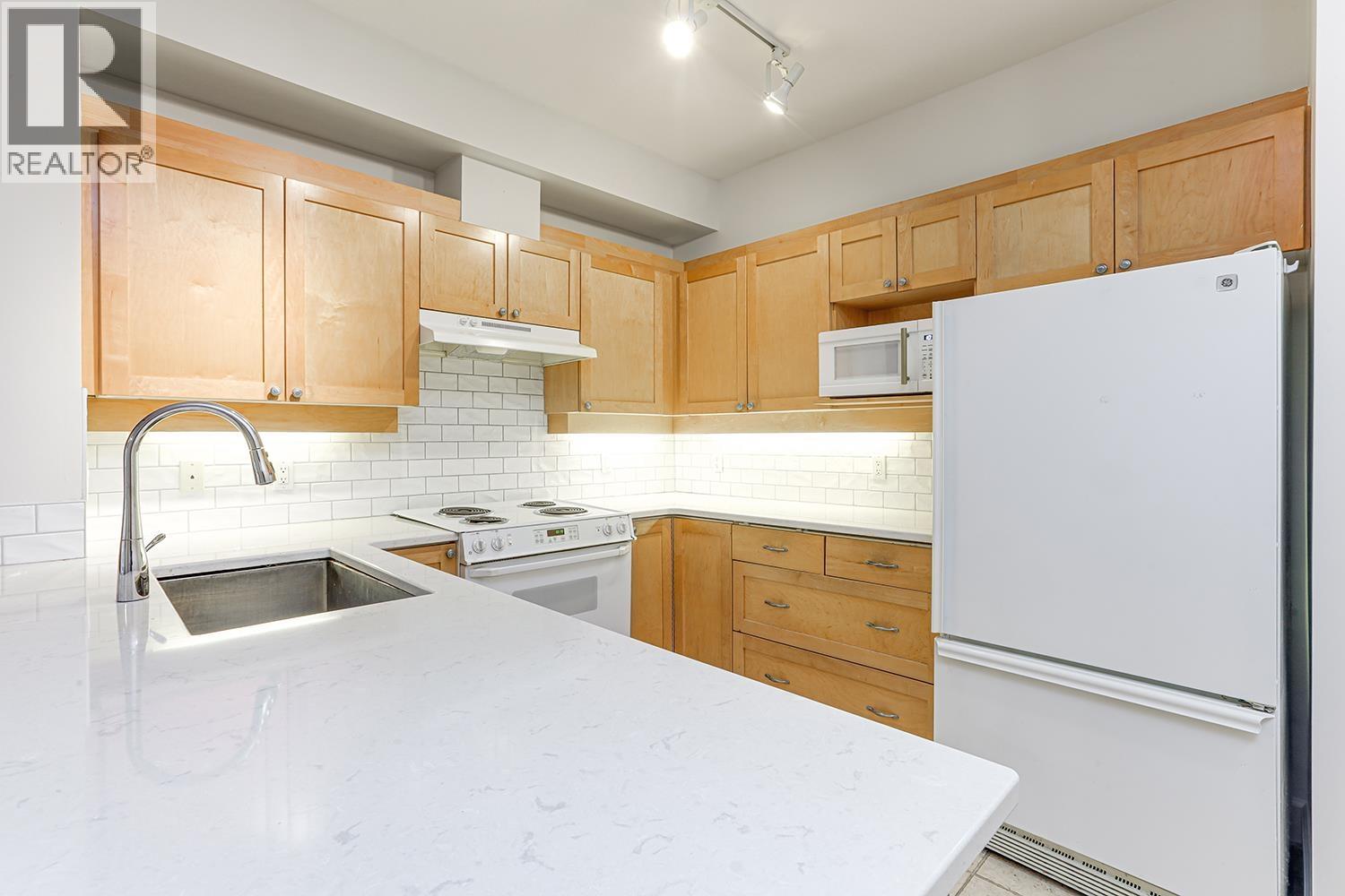 Photo 11 of 211 6198 Ash Street, Vancouver BC