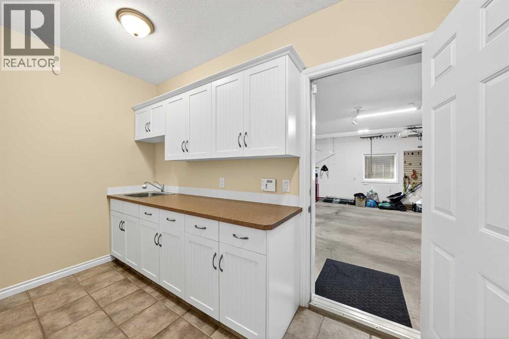 Single Family House Bungalow for Sale in  Signal Hill Terrace SW Signal Hill Calgary 