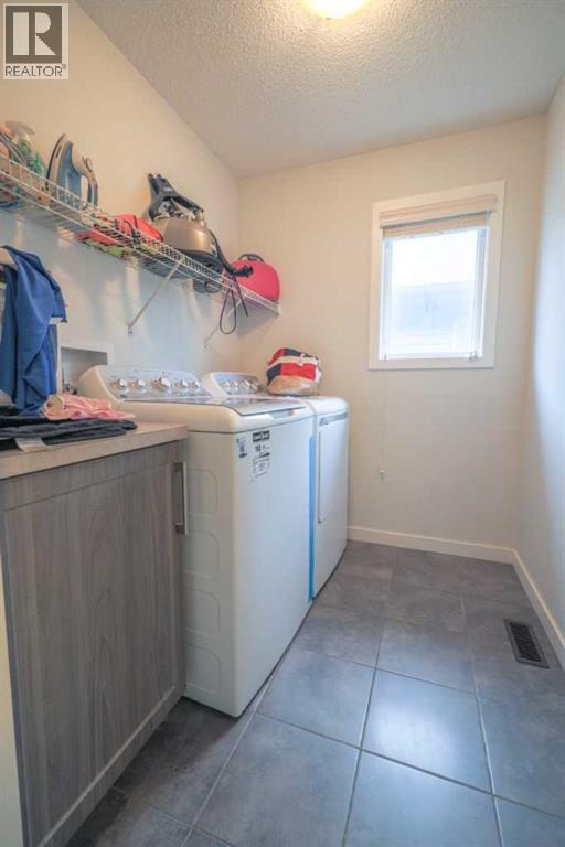 Photo 37 of 385 Kings Heights Drive Se, Airdrie AB