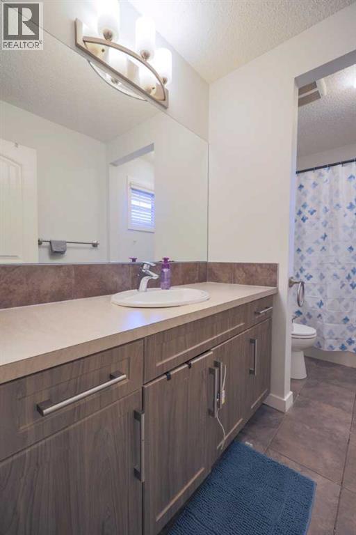 Photo 19 of 385 Kings Heights Drive Se, Airdrie AB