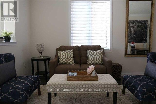 Photo 4 of 62 Robert Parkinson Drive, Brampton ON