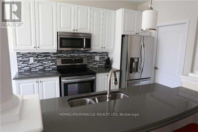 Photo 1 of 62 Robert Parkinson Drive, Brampton ON