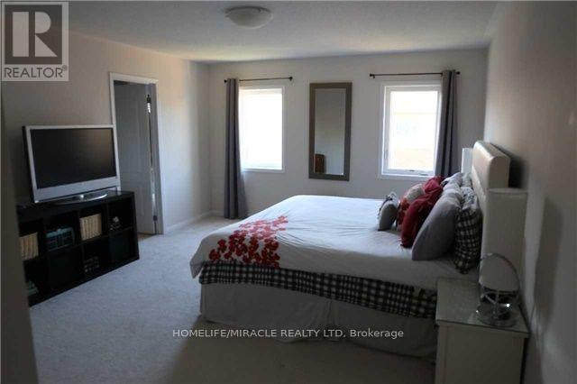 Photo 9 of 62 Robert Parkinson Drive, Brampton ON