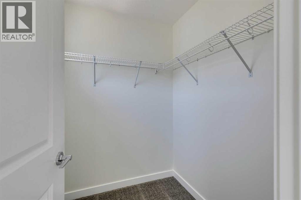 Photo 8 of 1410 25 Wildwoods Court Sw, Airdrie AB
