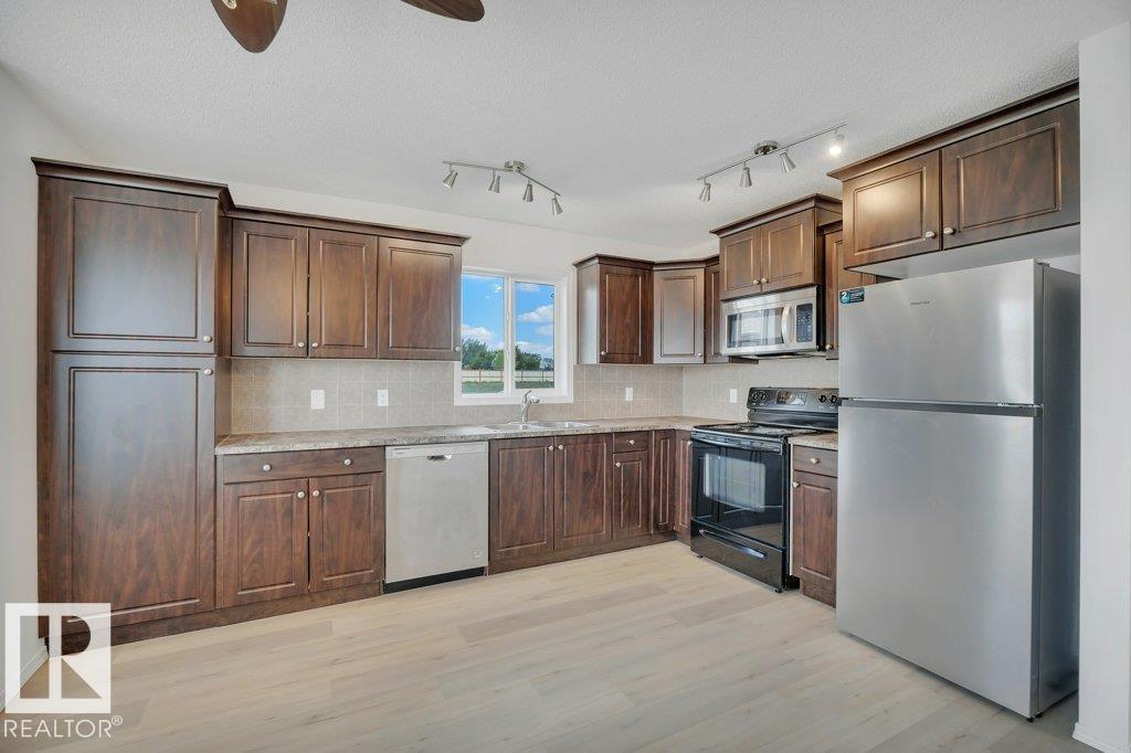 Photo 13 of 534 Songhurst Wy, Leduc AB