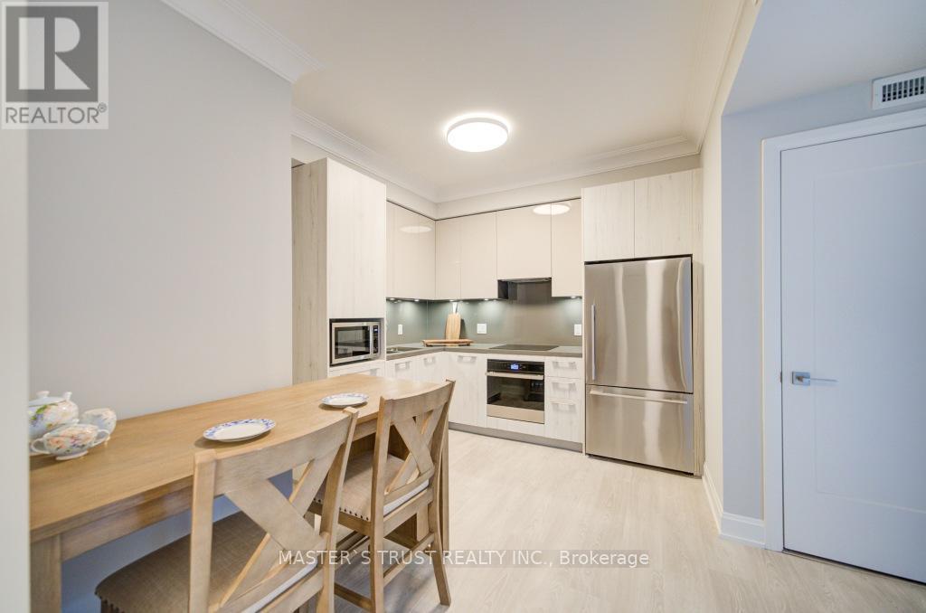 Photo 34 of 209 18 Water Walk Drive, Markham ON