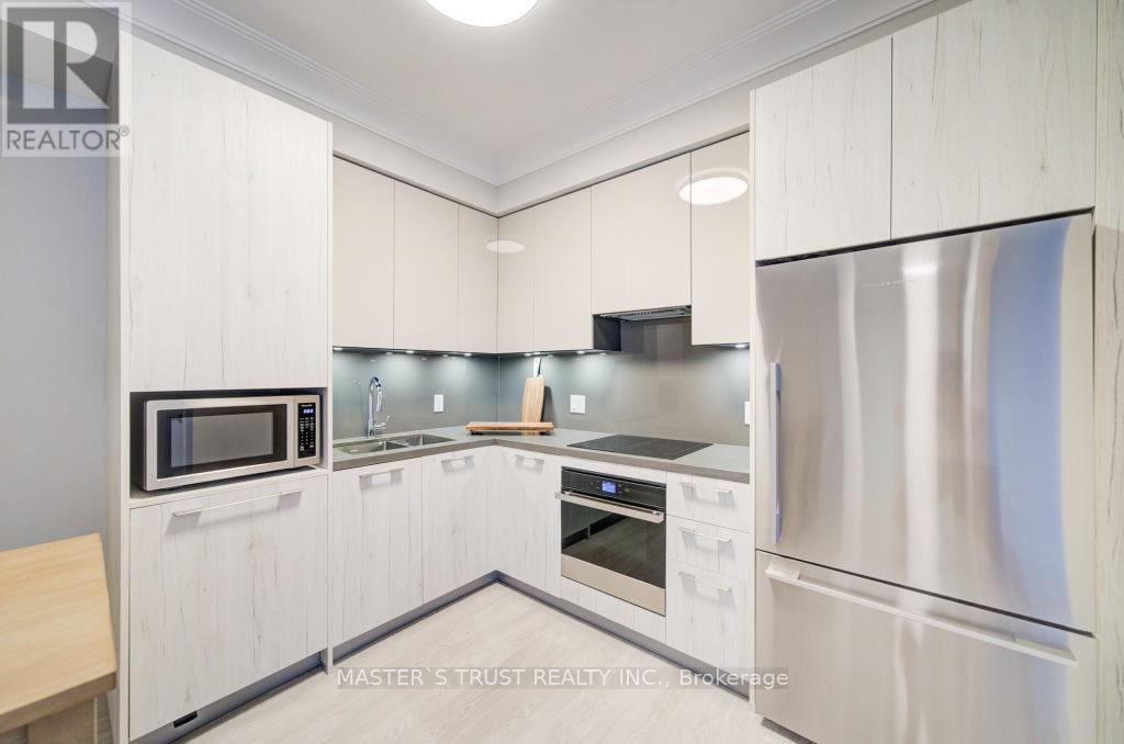 Photo 32 of 209 18 Water Walk Drive, Markham ON