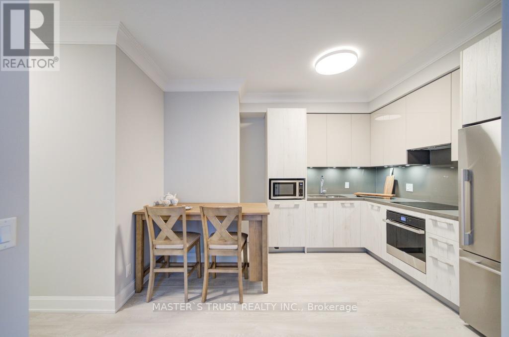 Photo 12 of 209 18 Water Walk Drive, Markham ON