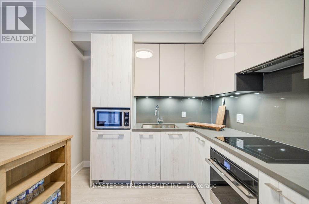 Photo 17 of 209 18 Water Walk Drive, Markham ON