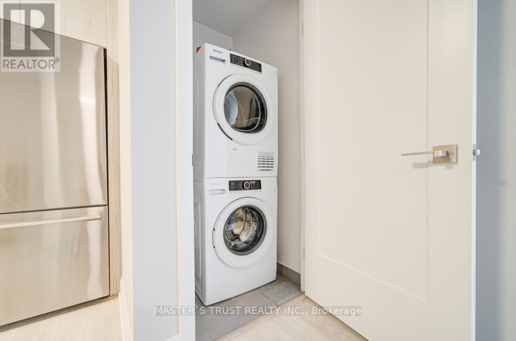 Photo 9 of 209 18 Water Walk Drive, Markham ON