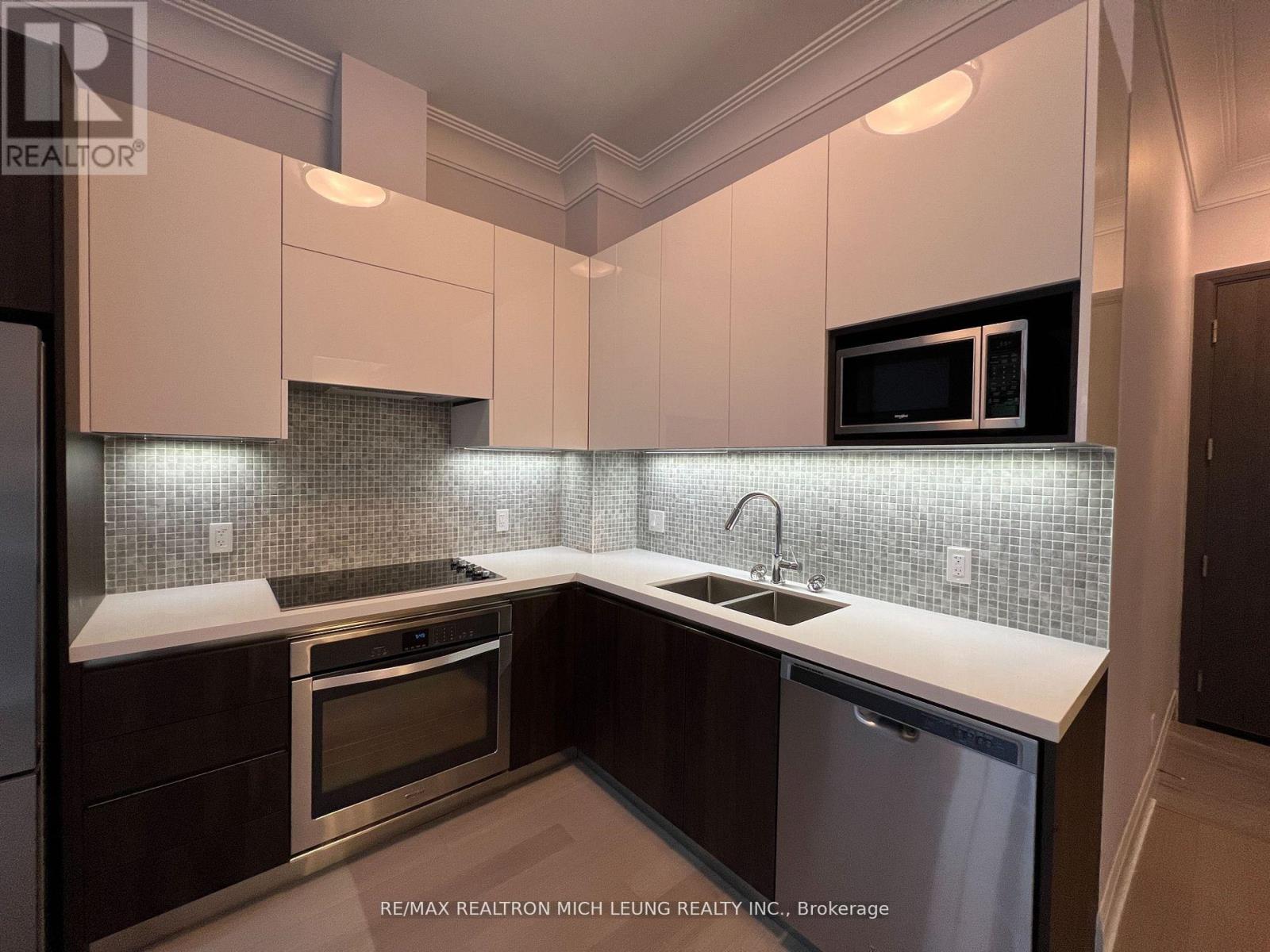 Photo 4 of 103 25 Water Walk Drive, Markham ON