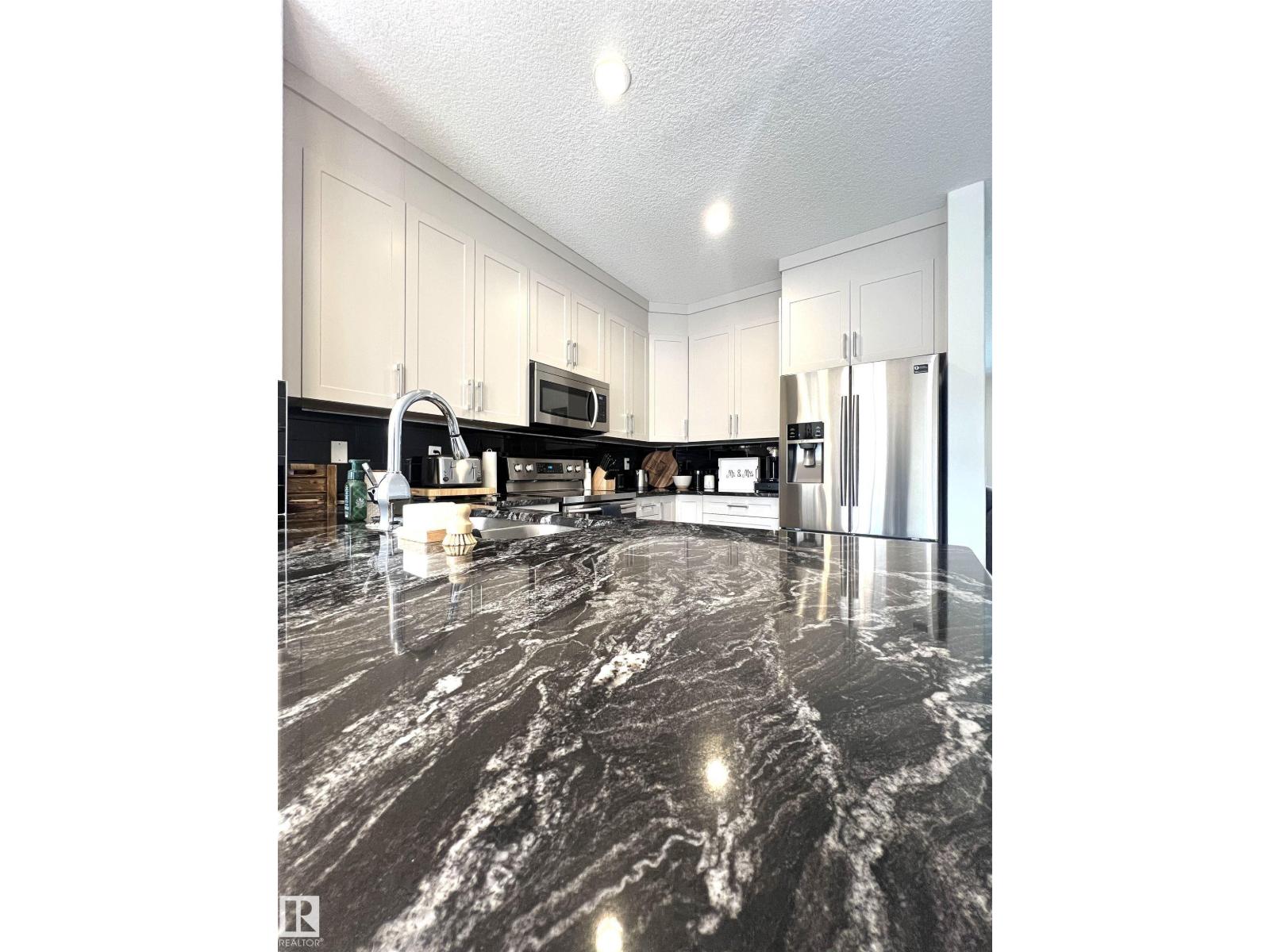 Photo 7 of 725 Berg Lo, Leduc AB
