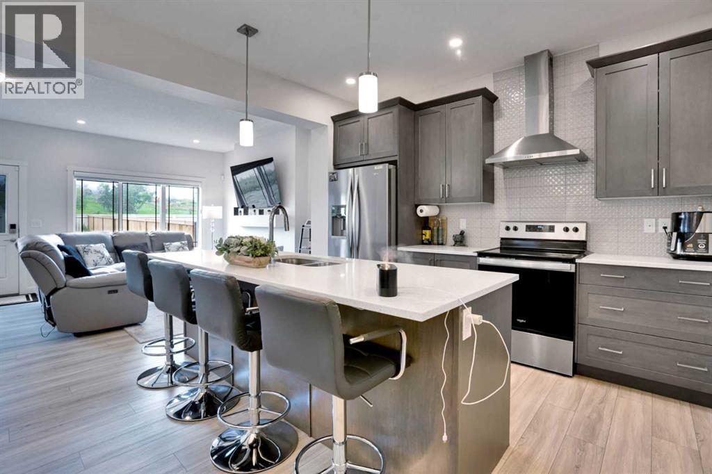 Photo 8 of 1457 Bayview Point Sw, Airdrie AB