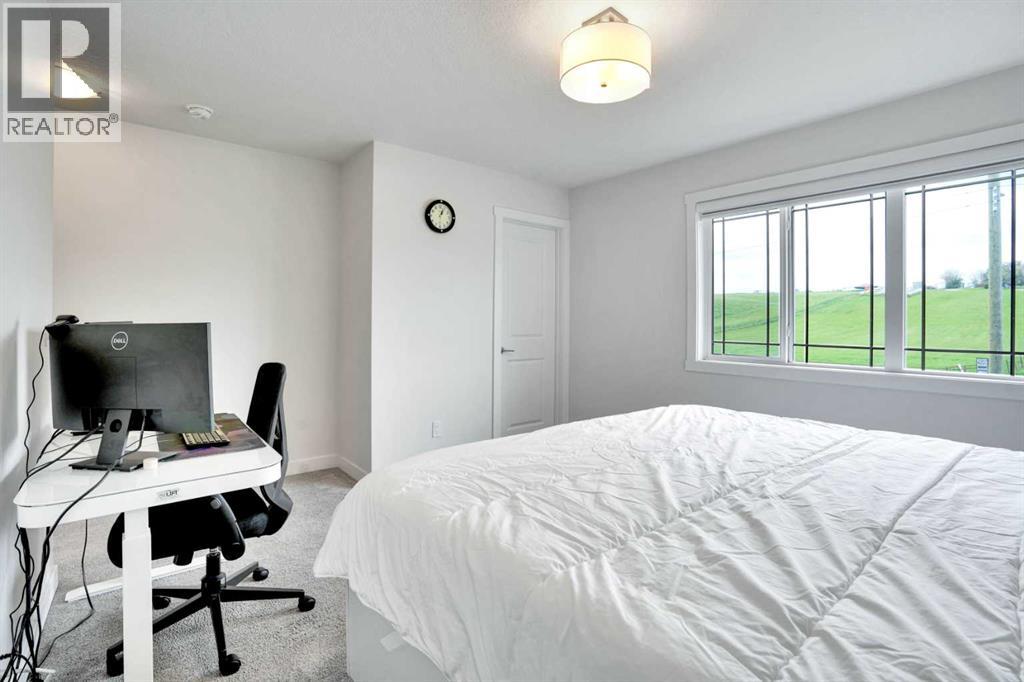 Photo 31 of 1457 Bayview Point Sw, Airdrie AB