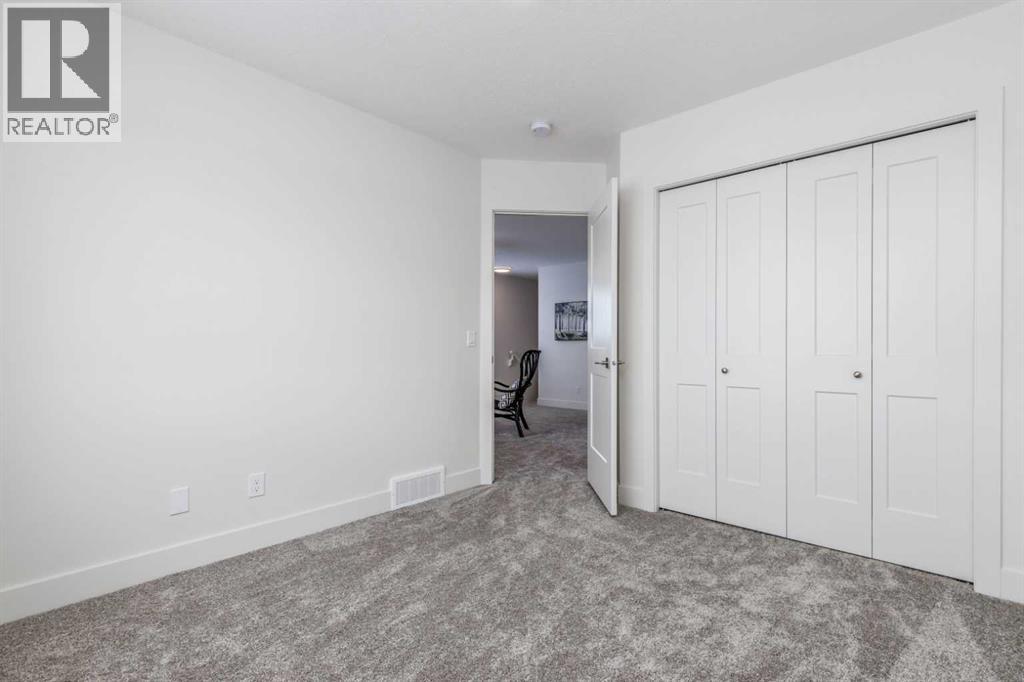 Photo 10 of 428 Rivercrest Road, Cochrane AB