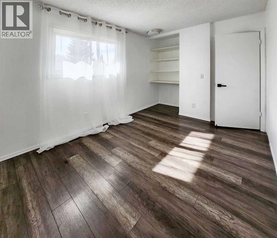Photo 46 of 59 Woodmont Way Sw, Calgary AB