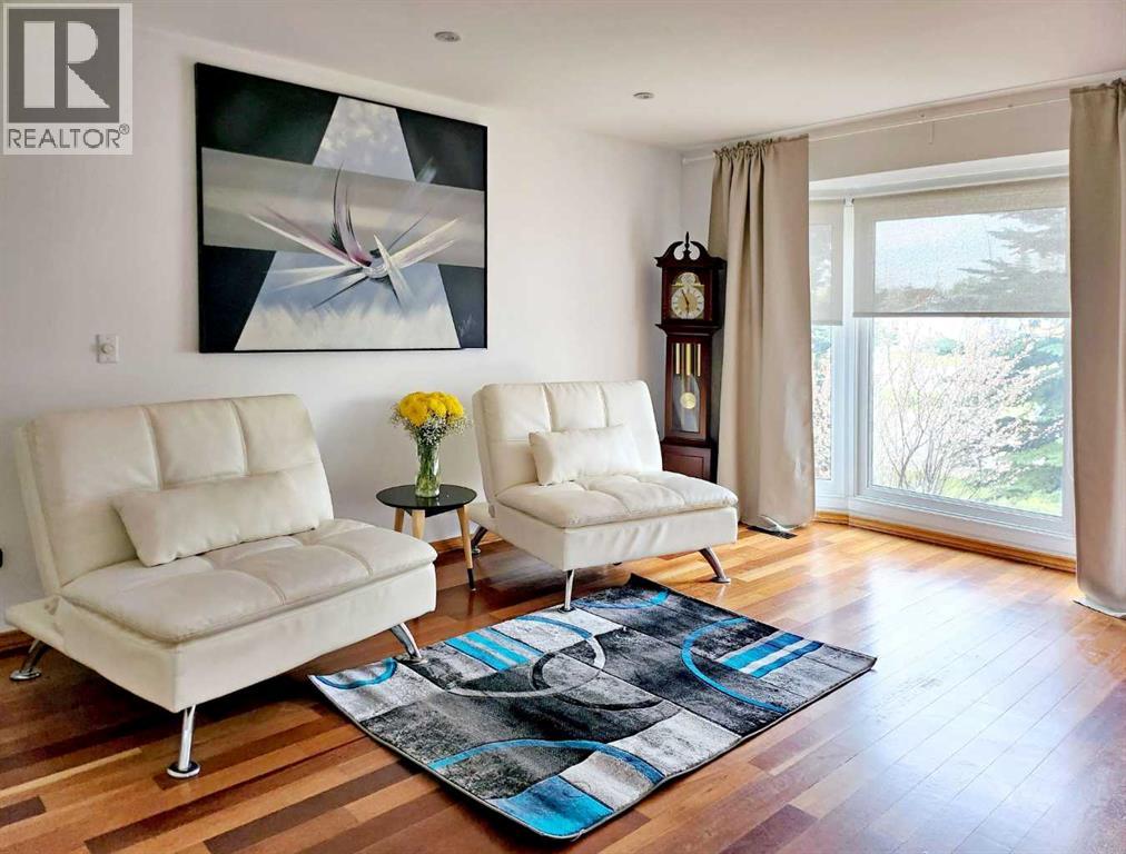 Photo 34 of 59 Woodmont Way Sw, Calgary AB