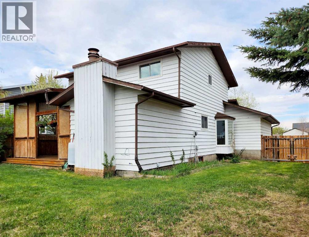 Photo 6 of 59 Woodmont Way Sw, Calgary AB