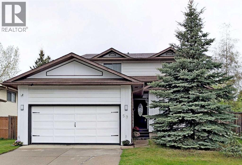 Photo 31 of 59 Woodmont Way Sw, Calgary AB