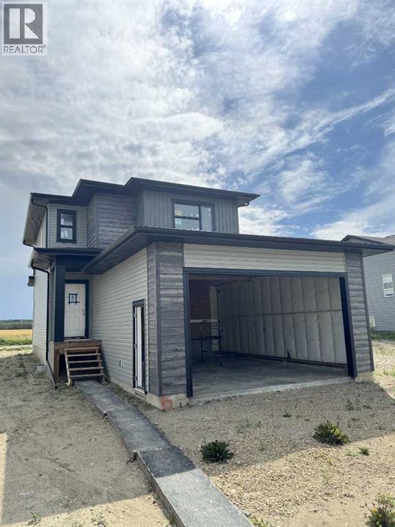 Photo 1 of 6 Ian Way, Sylvan Lake AB